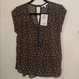 DR2 Floral Blouse , sheer, loose fitting, flowy.